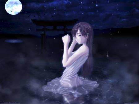 Jeune femme dans la nuit